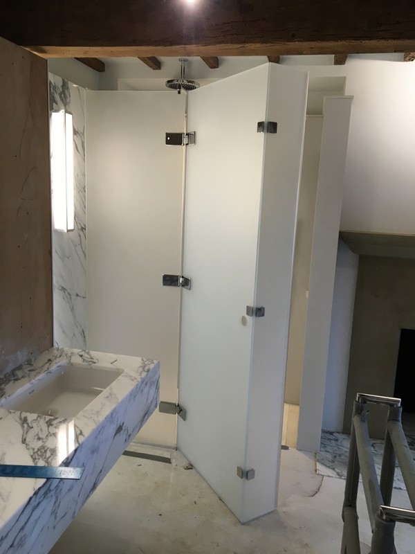 Bespoke frosted glass shower enclosure in Ealing luxury bathroom