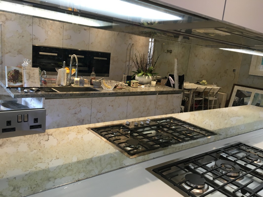 Mirror glass splashback in Ealing luxury kitchen
